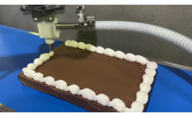 Apex Motion Control Dual Baker-Bot setup for robotic cake decorating